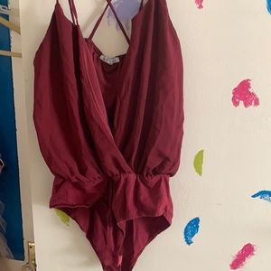 maroon cross cross body suit